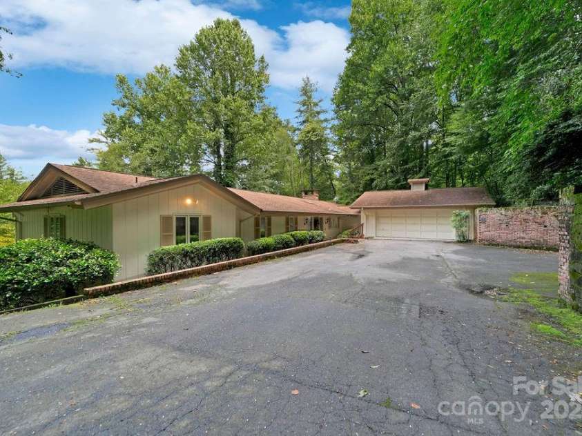 1315 Glen Cannon Drive, Pisgah Forest, NC 28768.  MLS# CAR4282131, YatesRealty ID 28696. Front of Home