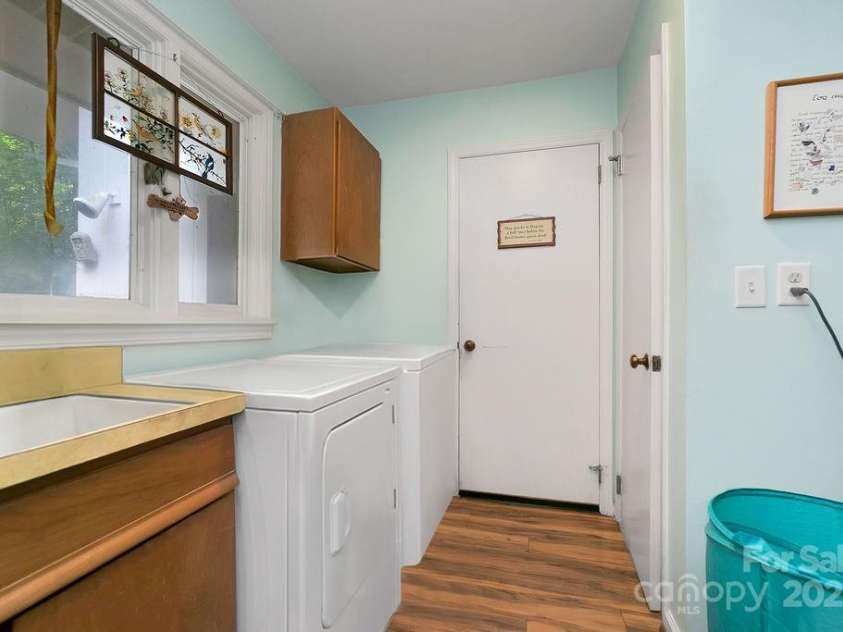1315 Glen Cannon Drive, Pisgah Forest, NC 28768.  MLS# CAR4282131, YatesRealty ID 28696. Laundry Room/Half Bath