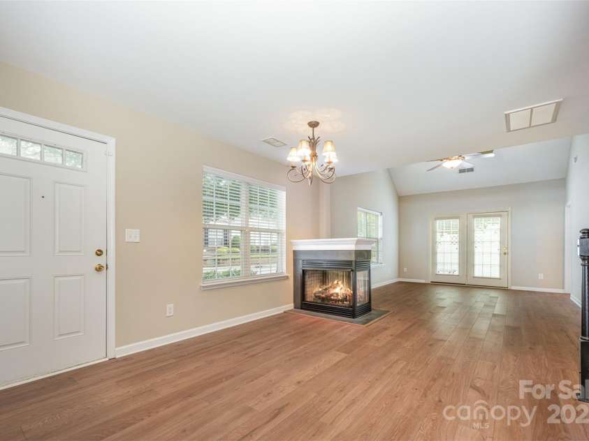 11921 Lambert Bridge Drive, Charlotte, NC 28270.  MLS# CAR4282578, YatesRealty ID 28698. Entry into open living space with new flooring
