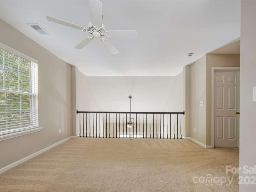 11921 Lambert Bridge Drive, Charlotte, NC 28270.  MLS# CAR4282578, YatesRealty ID 28698. Spacious upstairs loft