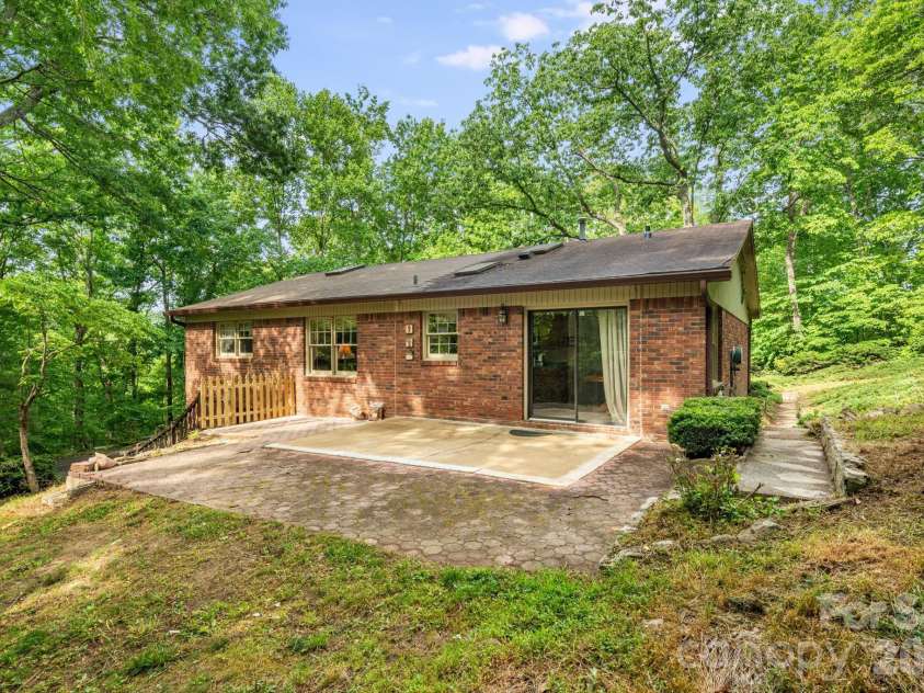 636 Goldview Drive, Hendersonville, NC 28791.  MLS# CAR4421812, YatesRealty ID 28699. Back Patio
