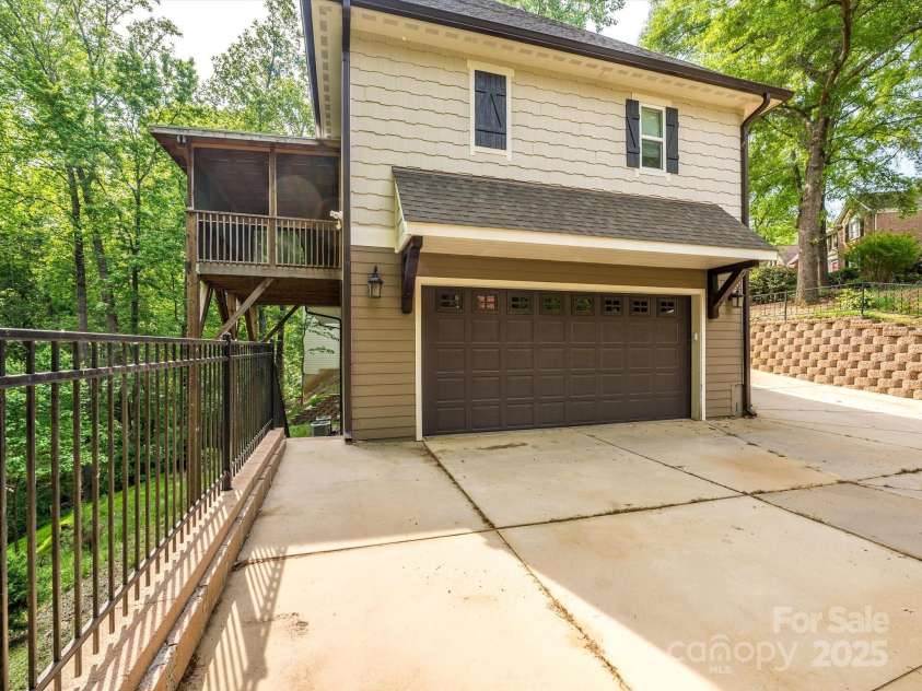 7324 Leharne Drive, Charlotte, NC 28270.  MLS# CAR4253021, YatesRealty ID 287. Side Exterior/Garage