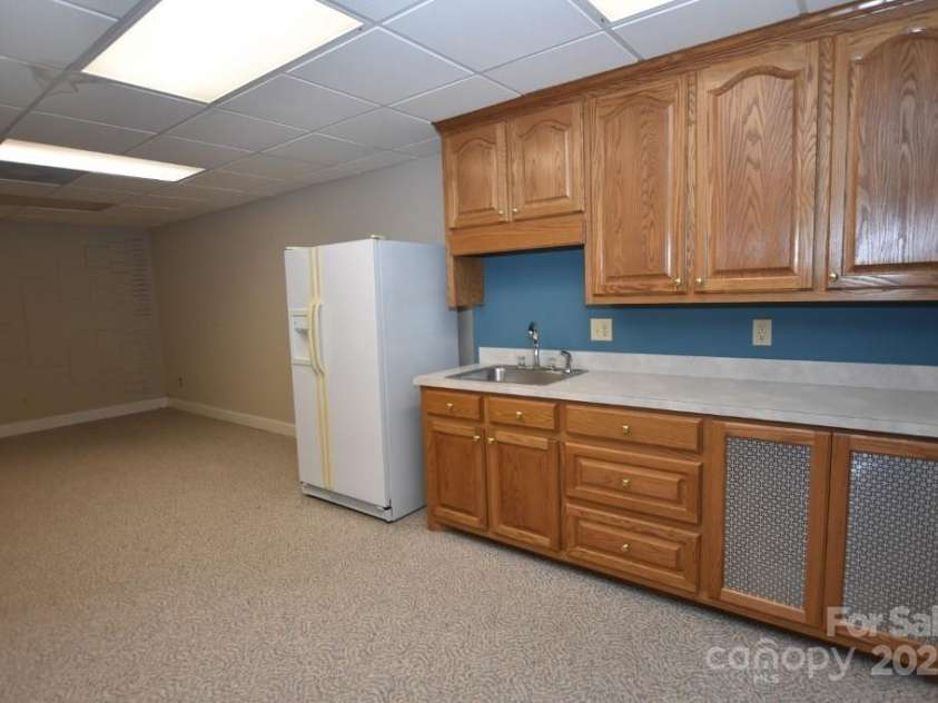111 Springwood Drive, Valdese, NC 28690.  MLS# CAR4232426, YatesRealty ID 2870. Downstairs Kitchen