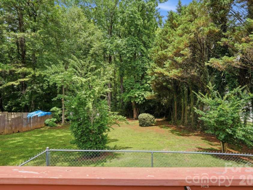 1037 Wilkerson Street, Belmont, NC 28012.  MLS# CAR4370201, YatesRealty ID 28702. Peaceful back yard