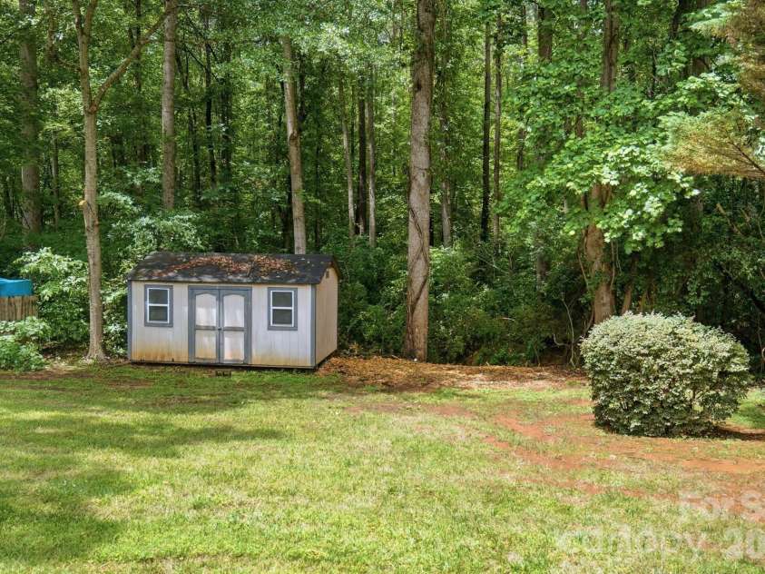1037 Wilkerson Street, Belmont, NC 28012.  MLS# CAR4370201, YatesRealty ID 28702. Storage building