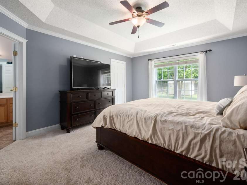 2009 Oakstone Drive, Monroe, NC 28110.  MLS# CAR4389615, YatesRealty ID 28705. Primary Bedroom