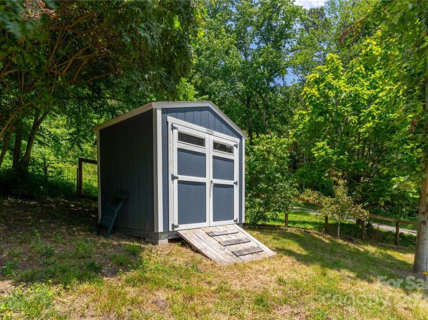 5 Koenig Way, Asheville, NC 28804.  MLS# CAR4280267, YatesRealty ID 28705. Shed for garden and yard gear.