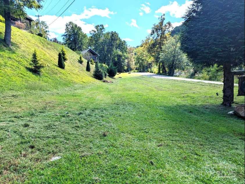 10 Rio Bravo Drive, Sylva, NC 28779.  MLS# CAR4296478, YatesRealty ID 2871. Approximate half the field