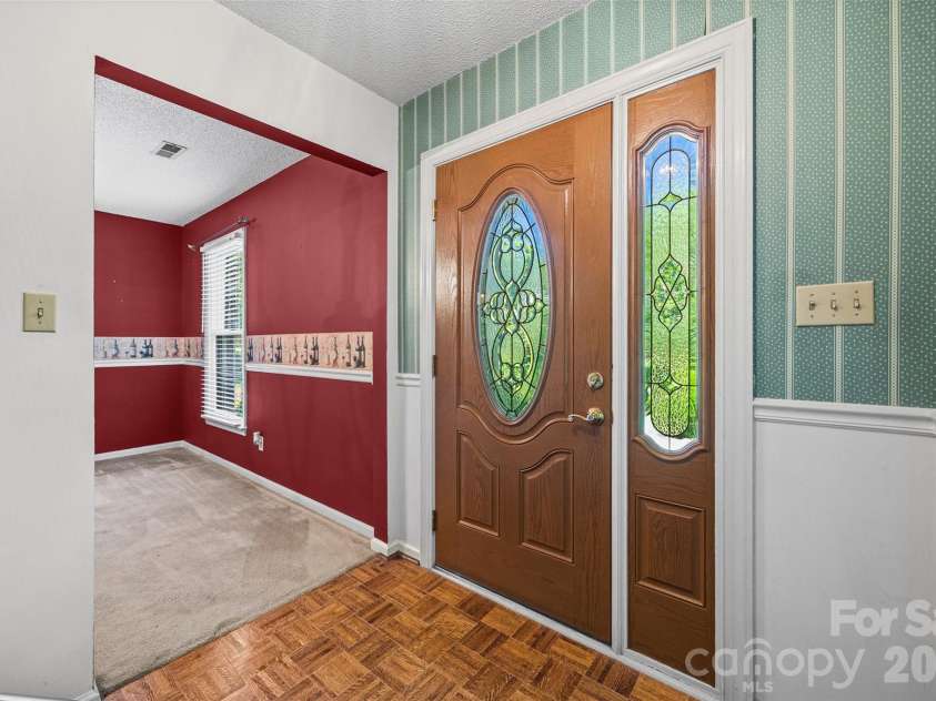 2998 Devonshire Drive, Rock Hill, SC 29732.  MLS# CAR4376859, YatesRealty ID 28710. Entryway looking into dining room