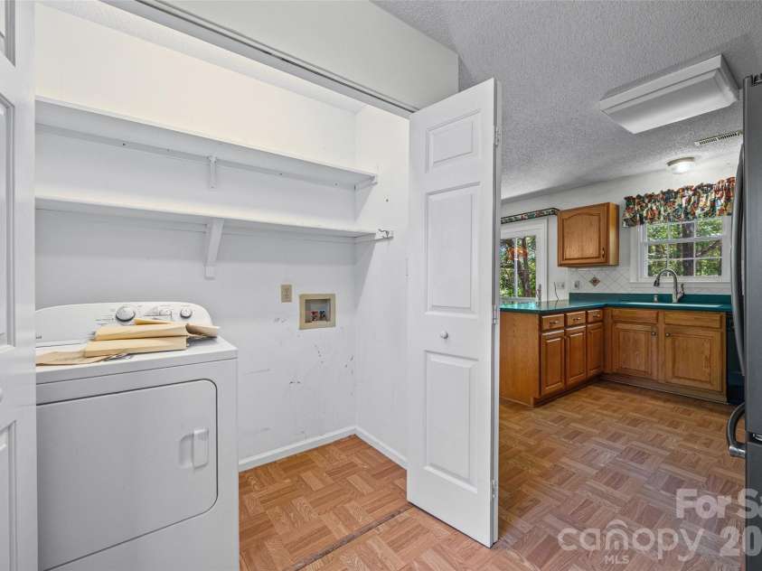 2998 Devonshire Drive, Rock Hill, SC 29732.  MLS# CAR4376859, YatesRealty ID 28710. Laundry area