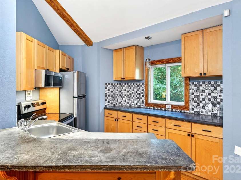 83 Cascades Parkway, Nebo, NC 28761.  MLS# CAR4281759, YatesRealty ID 28713. 