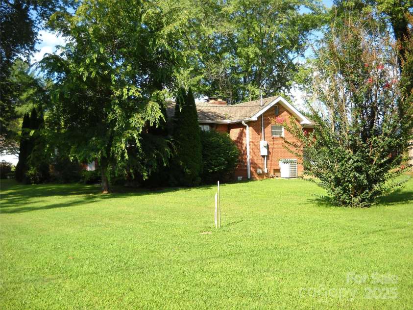 242 Liberty Road, Candler, NC 28715.  MLS# CAR4286036, YatesRealty ID 28715. 