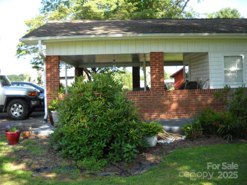 242 Liberty Road, Candler, NC 28715.  MLS# CAR4286036, YatesRealty ID 28715. 