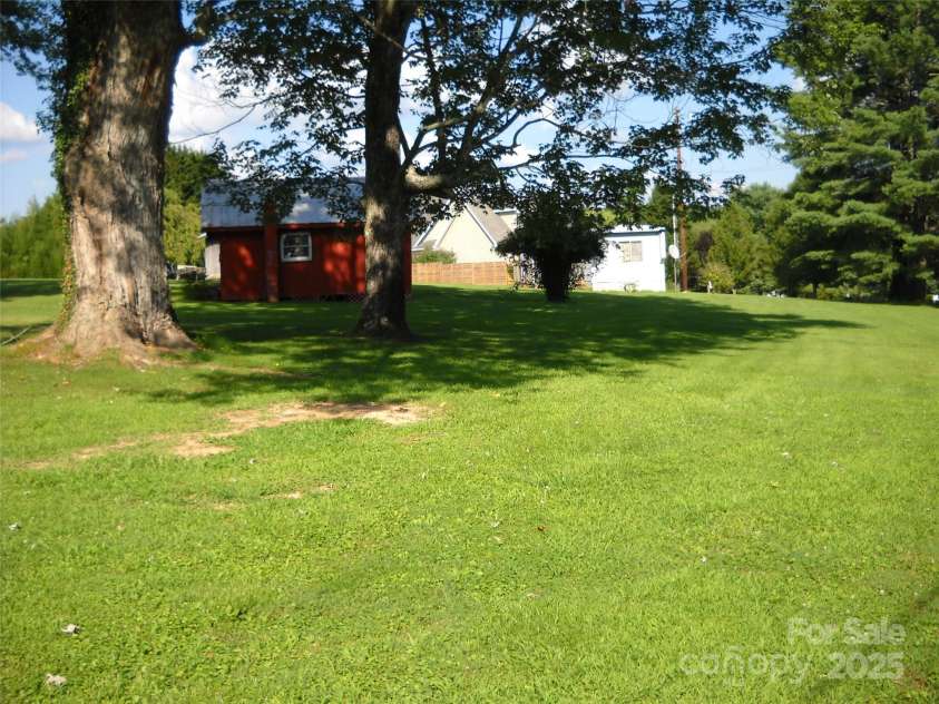 242 Liberty Road, Candler, NC 28715.  MLS# CAR4286036, YatesRealty ID 28715. 