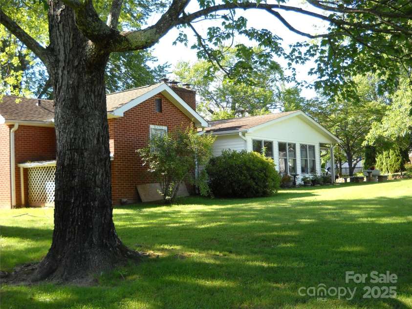 242 Liberty Road, Candler, NC 28715.  MLS# CAR4286036, YatesRealty ID 28715. 
