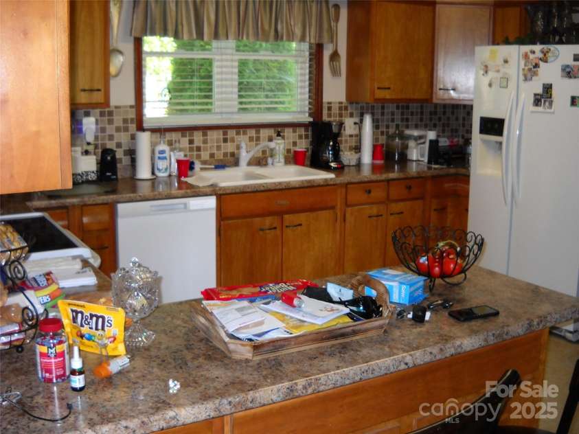 242 Liberty Road, Candler, NC 28715.  MLS# CAR4286036, YatesRealty ID 28715. 