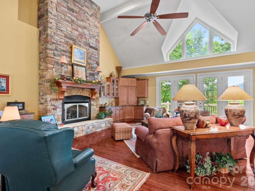 522 Silver Hawk Lane, Weaverville, NC 28787.  MLS# CAR4389288, YatesRealty ID 28715. Gorgeous stone fireplace feature.