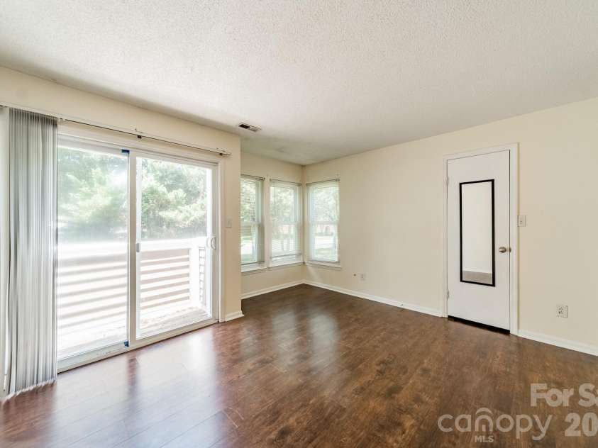 9605 Vinca Circle, Charlotte, NC 28213.  MLS# CAR4385047, YatesRealty ID 28719. Primary bedroom with private deck access