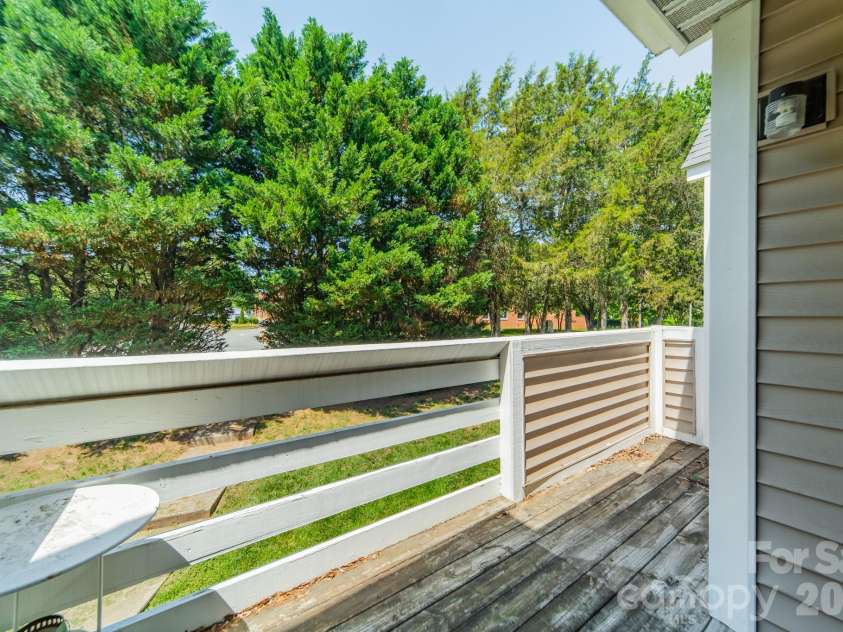 9605 Vinca Circle, Charlotte, NC 28213.  MLS# CAR4385047, YatesRealty ID 28719. Private deck overlooking wooded common area