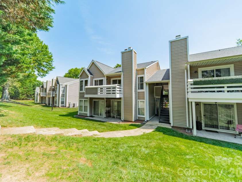 9605 Vinca Circle, Charlotte, NC 28213.  MLS# CAR4385047, YatesRealty ID 28719. Rear exterior overlooking green space
