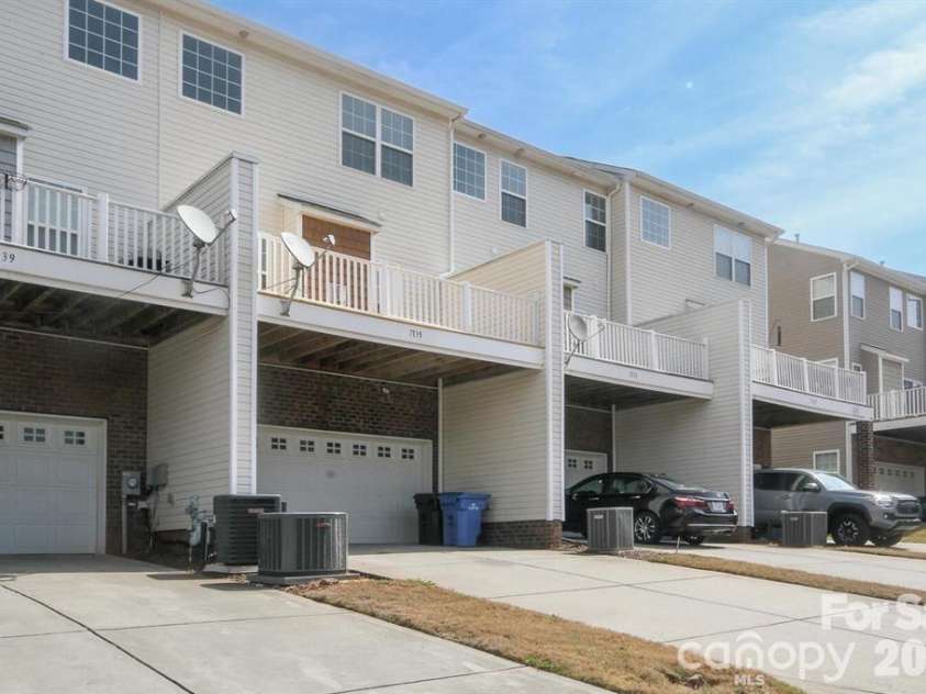 7139 Brighton Park Drive, Mint Hill, NC 28227.  MLS# CAR4382151, YatesRealty ID 28722. Rear view of unit