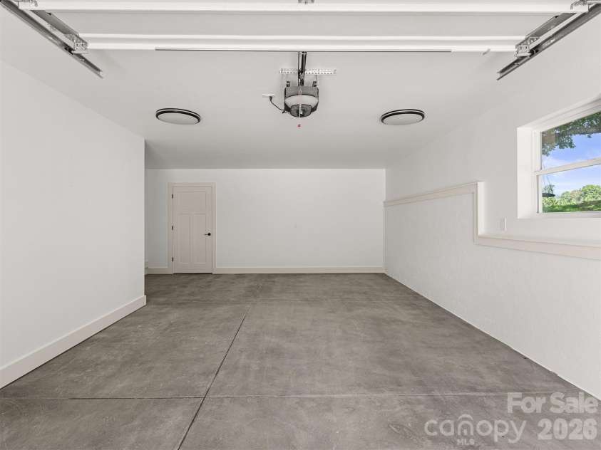 45 Klimovych Road, Hendersonville, NC 28792.  MLS# CAR4390237, YatesRealty ID 28727. GARAGE AREA WITH A UTILITY ROOM