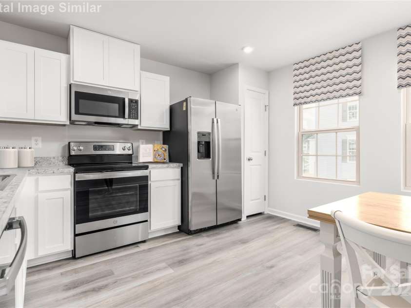 8017 District Drive, Charlotte, NC 28213.  MLS# CAR4280319, YatesRealty ID 28732. Building new lets you choose cabinets, countertops, flooring and more.  Create a home that is uniquely yours.