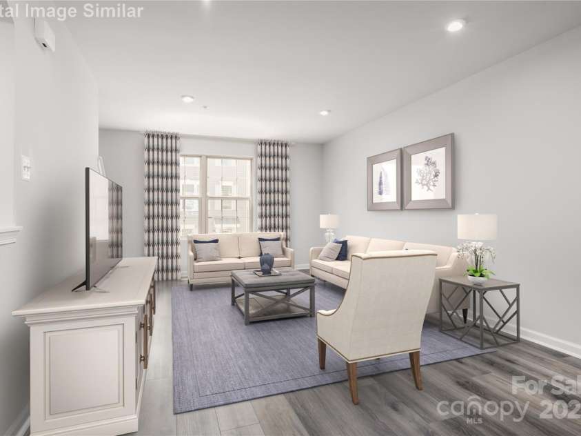 8025 District Drive, Charlotte, NC 28213.  MLS# CAR4280551, YatesRealty ID 28733. Your Perfect space for entertaining.  Enjoy a room living area perfect for hosting friends and family.  More space than a rental, ideal for gatherings and relaxation