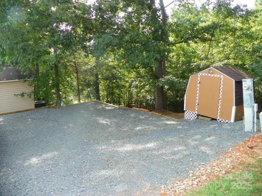 218 Cardinal Drive, New London, NC 28127.  MLS# CAR4284744, YatesRealty ID 28735. 