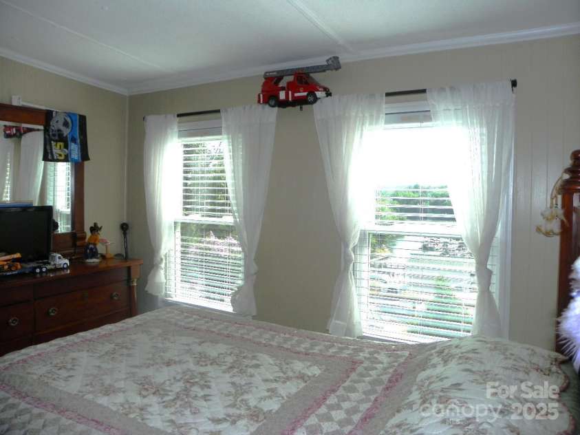 218 Cardinal Drive, New London, NC 28127.  MLS# CAR4284744, YatesRealty ID 28735. 