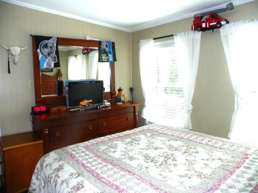 218 Cardinal Drive, New London, NC 28127.  MLS# CAR4284744, YatesRealty ID 28735. 