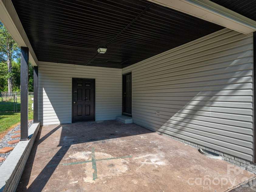 412 Forest Drive, Maiden, NC 28650.  MLS# CAR4389882, YatesRealty ID 28737. Carport