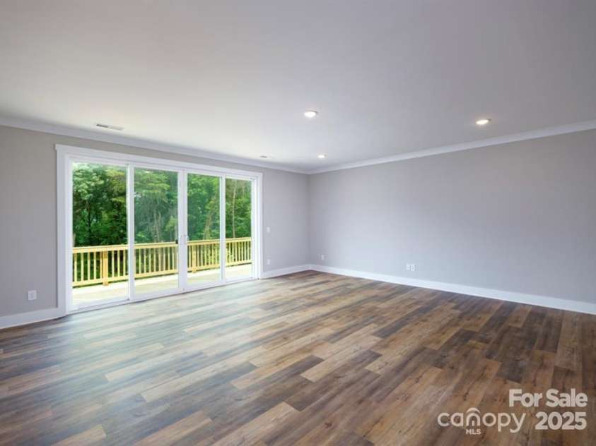114 Glencoe Lane, Mooresville, NC 28117.  MLS# CAR4221976, YatesRealty ID 28747. Living area with Double Slider to deck