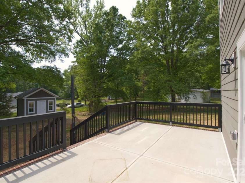 4006 Scarlet Drive, Matthews, NC 28104.  MLS# CAR4251173, YatesRealty ID 28758. Backyard Patio