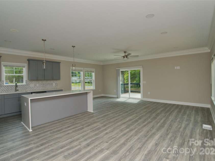 4006 Scarlet Drive, Matthews, NC 28104.  MLS# CAR4251173, YatesRealty ID 28758. Living and dining