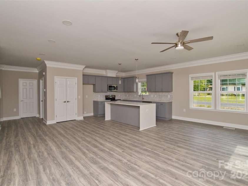 4006 Scarlet Drive, Matthews, NC 28104.  MLS# CAR4251173, YatesRealty ID 28758. Living and dining