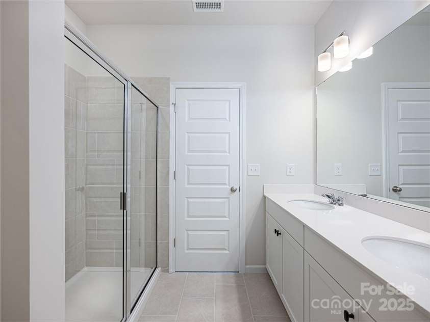 2535 Ruby Dixon Crossing Drive, Gastonia, NC 28056.  MLS# CAR4256272, YatesRealty ID 2876. Owner's suite bath 1
