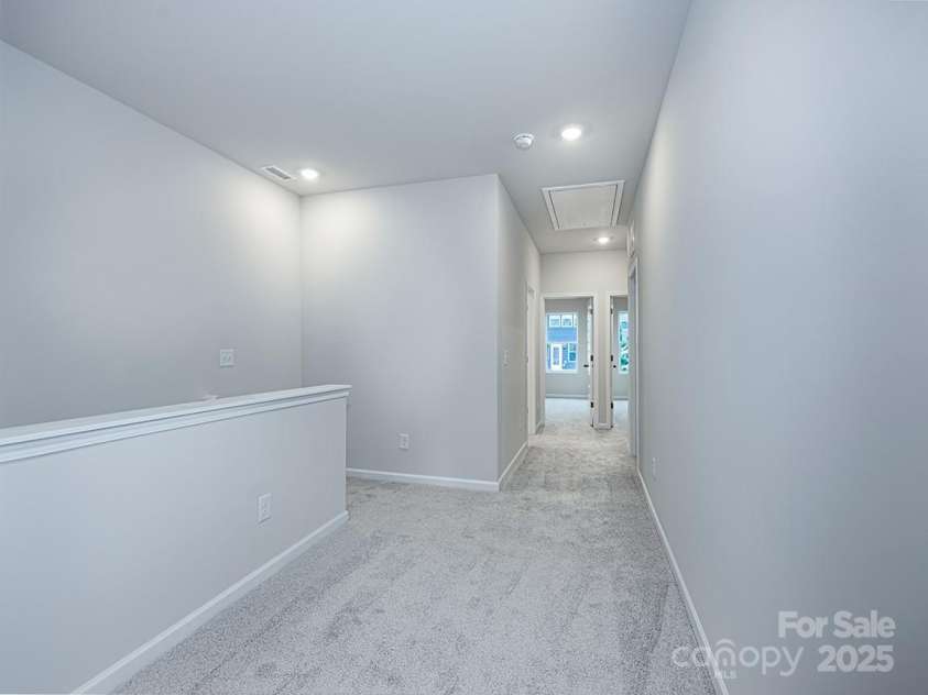 2535 Ruby Dixon Crossing Drive, Gastonia, NC 28056.  MLS# CAR4256272, YatesRealty ID 2876. Upstairs landing/loft area