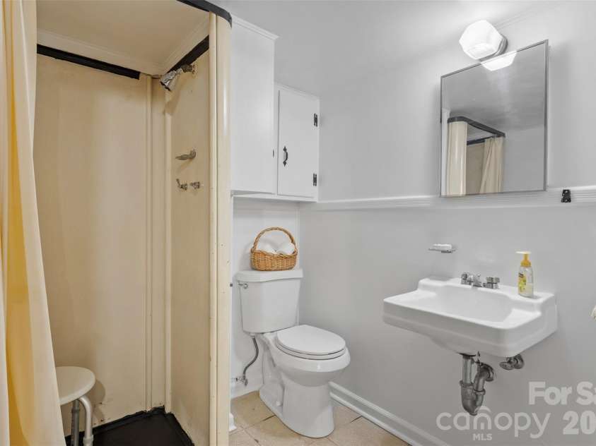 314 Old Leicester Highway, Asheville, NC 28806.  MLS# CAR4388057, YatesRealty ID 28763. Lower level full bath