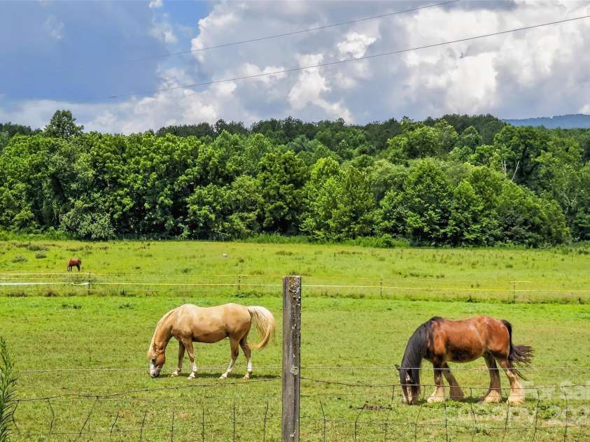 62 Ashe Bridge Road, Marion, NC 28752.  MLS# CAR4280563, YatesRealty ID 28763. 