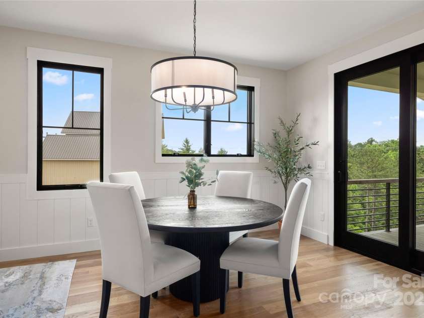 233 Westridge Farm Road, Asheville, NC 28804.  MLS# CAR4266061, YatesRealty ID 28764. Dining room with mountain views and upper porch access