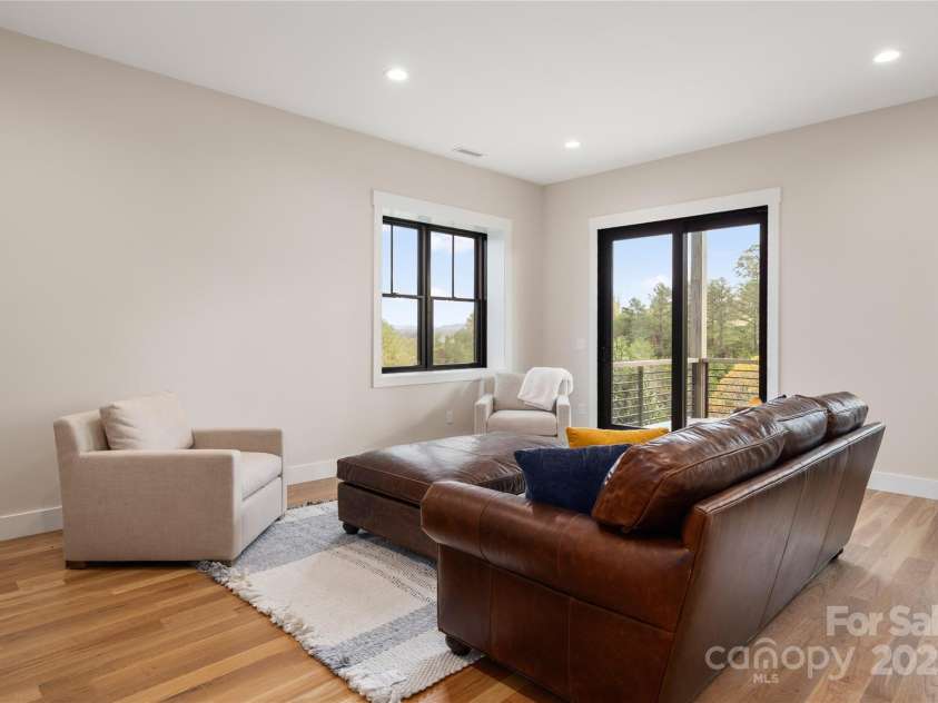 233 Westridge Farm Road, Asheville, NC 28804.  MLS# CAR4266061, YatesRealty ID 28764. Lower Flex Space with lower deck access