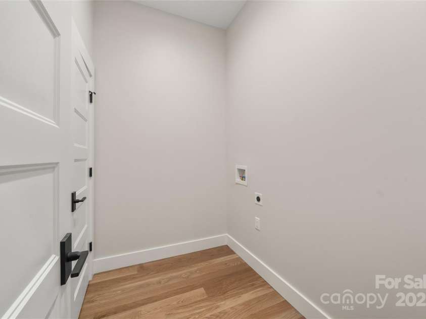 233 Westridge Farm Road, Asheville, NC 28804.  MLS# CAR4266061, YatesRealty ID 28764. Lower Laundry/storage