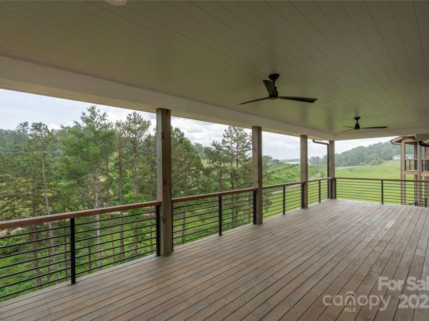 233 Westridge Farm Road, Asheville, NC 28804.  MLS# CAR4266061, YatesRealty ID 28764. Upper level porch/ fan 