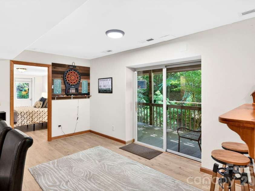 450 Elk Mountain Scenic Highway, Asheville, NC 28804.  MLS# CAR4386554, YatesRealty ID 28766. Access to outside deck