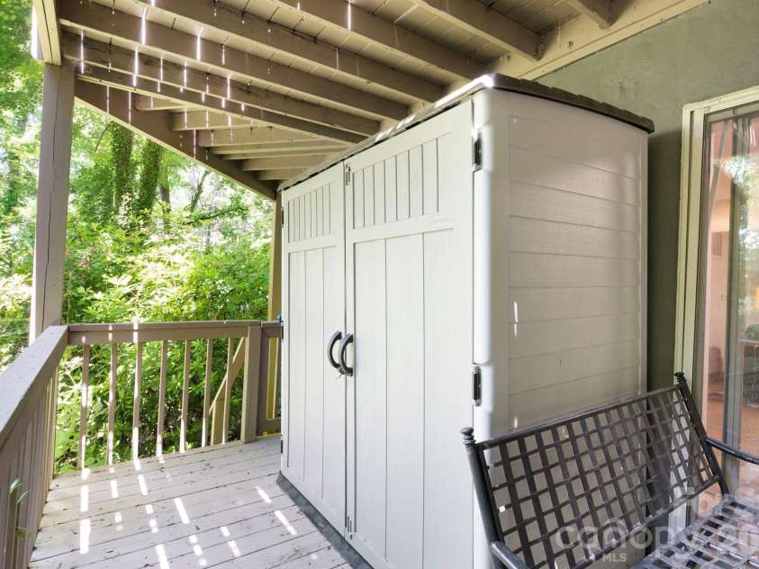 450 Elk Mountain Scenic Highway, Asheville, NC 28804.  MLS# CAR4386554, YatesRealty ID 28766. Additional storage space conveys