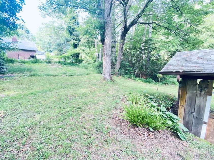 15 Valor Road, Glenville, NC 28736.  MLS# CAR4285294, YatesRealty ID 28767. 