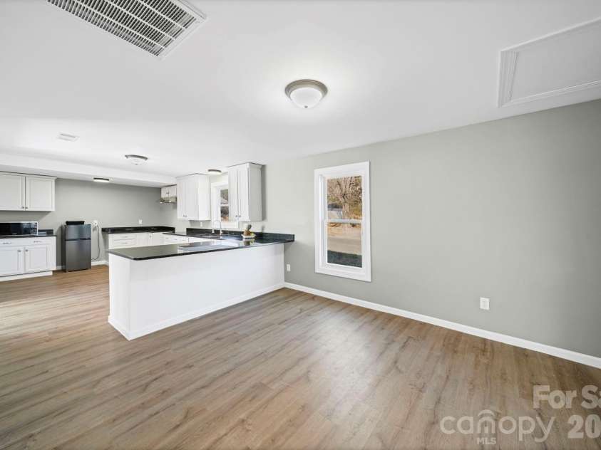 823 Hill Street, Albemarle, NC 28001.  MLS# CAR4331375, YatesRealty ID 2877. Dining Room & Kitchen