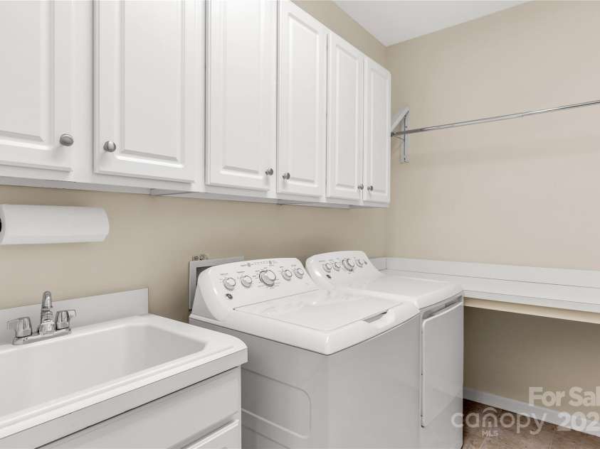 1079 Falling Leaf Street, Indian Land, SC 29707.  MLS# CAR4281587, YatesRealty ID 28772. Laundry room with laundry tub