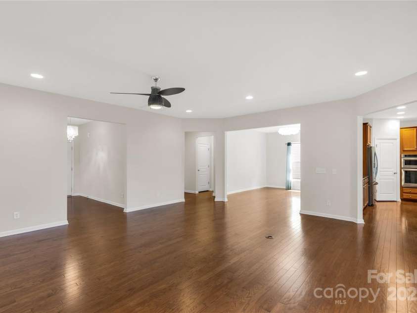 1079 Falling Leaf Street, Indian Land, SC 29707.  MLS# CAR4281587, YatesRealty ID 28772. View from the Great Room into the dining room and kitchen.